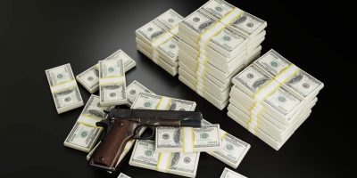 Gun-and-Piles-of-Money-1